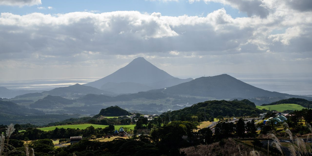 View a beautiful mountain popularly called Satsuma Fuji beyond idyllic landscape