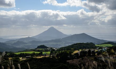 View a beautiful mountain popularly called Satsuma Fuji beyond idyllic landscape