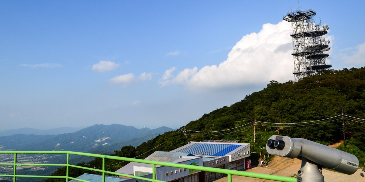 Climb up to the top of the sacred mountain by cable car